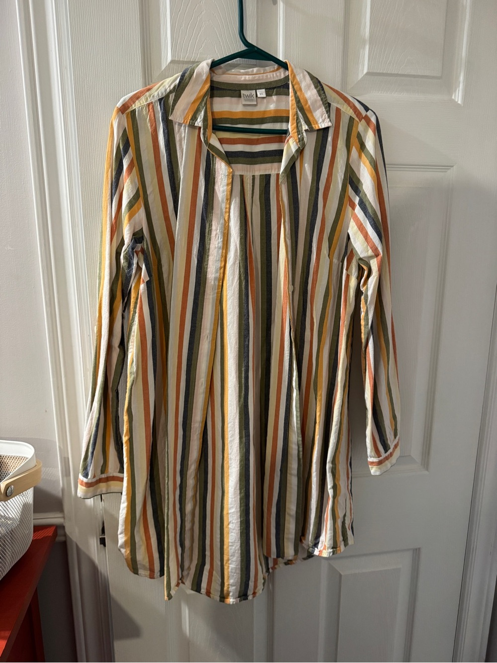 Striped Long Line Button-Front Top. White with orange, yellow, blue stripes